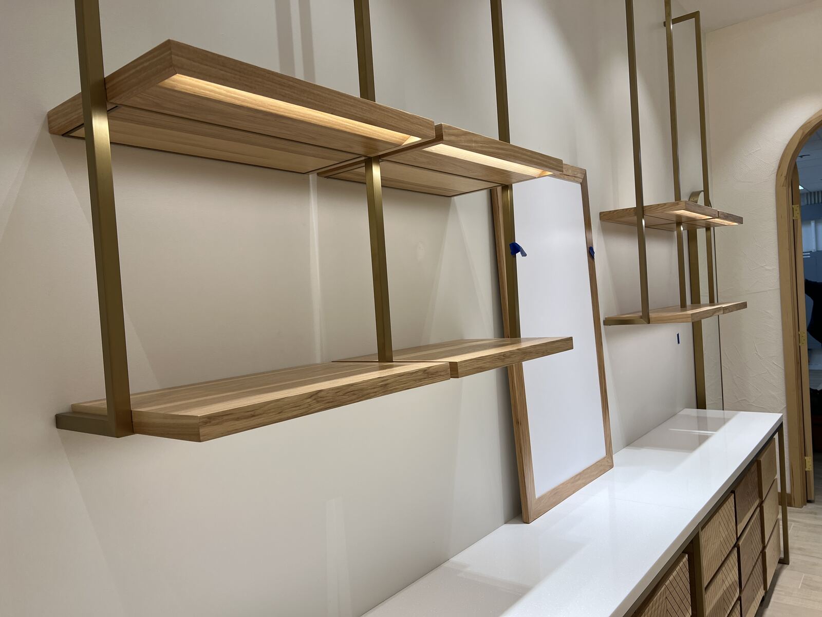 Custom wood shelving with integrated LED lighting